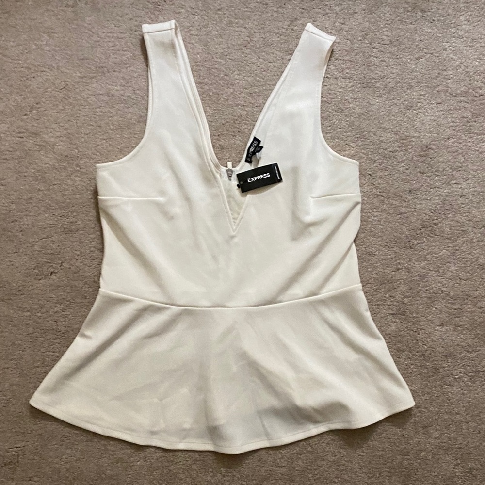 🌟Express White Peplum top with mesh detail 🌟